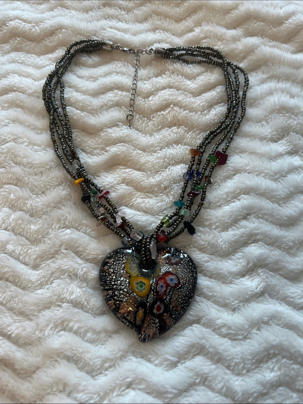 Multistrand Black Beaded Necklace with Colorful Glass Heart Pendant